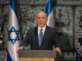 Israeli Prime Minister Benjamin Netanyahu gives a speech after he was formally given the task, by Israeli President Reuven Rivlin, to form the next government, at the president's residence in Jerusalem on March 25, 2015. AFP PHOTO / MENAHEM KAHANA