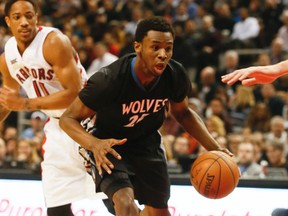 Andrew Wiggins of the Timberwolves drives the ball against the Raptors during NBA action in Toronto on March 18, 2015. (Stan Behal/QMI Agency)