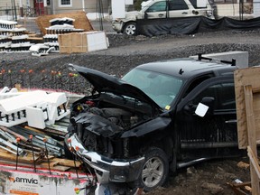 The result of a SUV and pickup truck's run in at the corner of Johnson and Macdonnell Streets in Kingston, Ont. on Wednesday March 25, 2015. Steph Crosier/Kingston Whig-Standard/QMI Agency