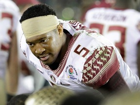 Quarterback Jameis Winston of the Florida State Seminoles stands on the sidelines during NCAA action against the Oregon Ducks at the Rose Bowl January 1, 2015 in Pasadena, Calif. (Jeff Gross/Getty Images/AFP)