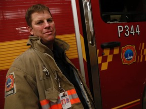 Toronto firefighter Jason Gilbert, seen Wednesday, March 25, 2015, will receive an off-duty firefighter award for saving a woman from drowning while he was on vacation in Costa Rica. (Jack Boland/Toronto Sun)