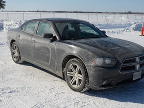 Ottawa Police released these photos of the 2014 Dodge Charger they believe was the getaway car in the Feb. 6 shooting death of 27-year-old gang member Yusuf Ibrahim at a Forestglades Cr. rowhouse. Police say the car was seen speeding away from the scene. They want to talk to three men they say were occupants. Ottawa Police handout, Special to the Ottawa Sun