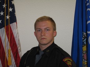 Trooper Trevor Casper is pictured in this undated handout photo provided by the Department of Justice. Casper, a recently graduated Wisconsin State Patrol officer, and a suspect in two bank robberies were killed in an exchange of gunfire outside a store in Fond du Lac, authorities said on March 25, 2015. REUTERS/Department of Justice/Handout