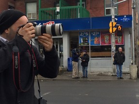 Media along Elgin St. to record the opening of the Sens Mile ended up with no story ... the Senators don't want the strip redesignated until after they clinch a playoff spot -- p4rovided they get there. (TONY CALDWELL Ottawa Sun