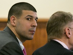 Former NFL player Aaron Hernandez listens during a motion regarding jail phone recordings during his murder trial at the Bristol County Superior Court. (REUTERS/Dominick Reuter)