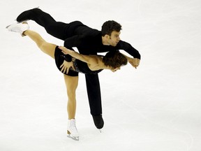 Meagan Duhamel and Eric Radford of Canada compete in the pairs free skating program during the ISU World Figure Skating Championship in Shanghai March 26. (REUTERS/Carlos Barria)