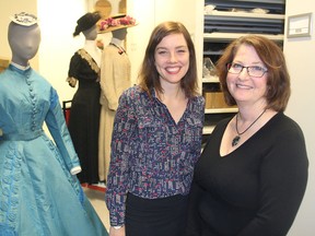 Elaine MacKay, right, and intern Emma Neale have been working on restoring historical dresses from the Queen's University collection, also learning about the women who wore them. THURS., MARCH 26, 2015..KINGSTON, ONT...MICHAEL LEA THE WHIG STANDARD QMI AGENCY