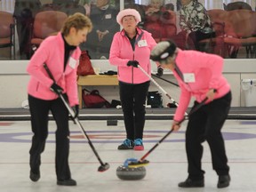 Liz Baer, left, Teresa Wilson and Alice Pignal from the Royal Kingston Curling Club dressed to impress in pink for the 43rd annual Grandmothers and Great-Aunts bonspiel at the Royal Kingston Curling Club on Wednesday. (Julia McKay/The Whig-Standard)