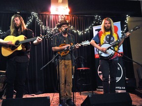 The Thames River Valley Boys, Adam Stevenson (left), Dan Henshall and Chris Stevenson, perform at the London Music Club during a media event for the Home County Folk Festival in London Ont. March 25, 2015. CHRIS MONTANINI\LONDONER\QMI AGENCY