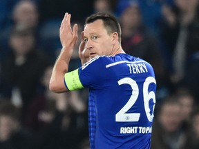 Chelsea’s John Terry applauds the fans at the end of the Champions League match against Paris St. Germain at Stamford Bridge. (Reuters/Toby Melville)