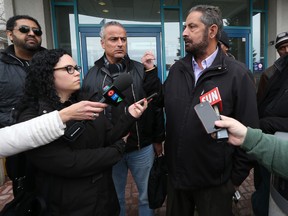 Amrik Singh, President of the Union Local 1688, talks to the media in Ottawa Thursday March 26,  2015. Two more Uber drivers pleaded guilty to driving unlicensed taxis in Ottawa on Thursday. Wilmond Celiba and Sedik Said both entered guilty pleas for offering taxi services last fall without licenses. In a joint submission by the city’s counsel and the defence lawyer, the drivers must each pay $400 fines.  Tony Caldwell/Ottawa Sun/QMI Agency