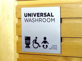 Vancouver Park Board put up gender-neutral signage at Hillcrest Community Centre on Thursday as part of its awareness campaign. 
(David La Riviere, 24 hours)