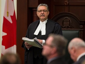 Speaker of the House Gene Zwozdesky speaks before Alberta finance minister Robin Campbell delivers Budget 2015 in the Alberta Legislature in Edmonton, Alta., on Thursday, March 26, 2015. Ian Kucerak/Edmonton Sun