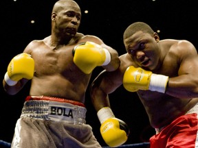 Raymond Olubawale (right), seen here fighting Demetrice King in 2008, will battle 51-year-old Donovan Ruddock on Saturday night in Mississauga. (Dave Thomas/Toronto Sun)