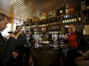 Tourists visit Bacalhoa winery in Azeitao February 11, 2015. Portugal is making a splash in the wine world, with some critics likening its recent advances in quality to a revolution, and another reason to visit a country otherwise known for its beaches, art and food. Just as Portugal's tourism sector is breaking records in visitor numbers, wine tourism is expanding with dozens of "quintas" and "herdades" - vineyards and estates - open for visits and tastings. REUTERS/Rafael Marchante