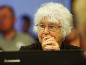 Luke Hendry/The Intelligencer
Quinte Health Care board member Darlene O'Farrell looks up from her computer after speaking during a meeting at Belleville General Hospital. She said a care model such as the one proposed by QHC could have prevented her late father from much suffering and rapid deterioration.