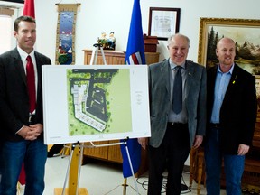 (Left to Right) Reeve Brian Hammond, MP John Barlow, Mayor Don Anderberg and MLA Jeff Johnson pose with a digital rendering of the new $12 million, 50-unit seniors' lodge to replace Crestview by 2017. Greg Cowan photo/Pincher Creek Echo.