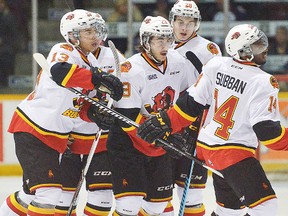 Belleville Bulls teammates congratulate Jordan Subban after his first-period power play goal in Thursday's 3-2 loss to Barrie in Game 1 of the Bulls-Colts playoff series at the Molson Centre. (Ian McInroy/Barrie Examiner)
