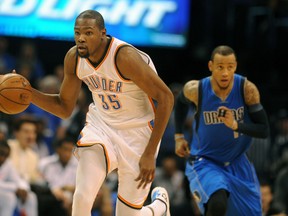 Oklahoma City Thunder forward Kevin Durant (35) brings the ball up the court against the Dallas Mavericks during the fourth quarter at Chesapeake Energy Arena. Mark D. Smith-USA TODAY Sports