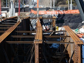 The 102 Avenue Bridge project is seen in Edmonton, Alta., on Friday, March 27, 2015. The City of Edmonton and contractors are working to repair four bent steel girders on the project, which bent during installation on March 16. The City of Edmonton's Barry Belcourt says repairs are on schedule for an April 7 reopening of Groat Road. Ian Kucerak/Edmonton Sun/ QMI Agency