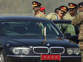 Pakistani Army Chief of Staff General Raheel Sharif leaves after attending the Pakistan Day parade in Islamabad March 23, 2015. Pakistan held its first Republic Day parade in seven years on Monday, full of flag-waving pomp and aerial military expertise, a symbolic show of strength in the war against the Taliban months after a militant attack on a school killed 132 children. Pakistan Day commemorates March 23, 1940, when the Muslim League demanded the establishment of separate nations to protect Muslims in the then British colony of India. REUTERS/Faisal Mahmood