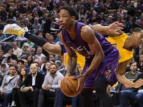 Raptors’ DeMar DeRozan looks to get a shot off against the Lakers at the Air Canada Centre last night. (Craig Robertson/Toronto Sun)
