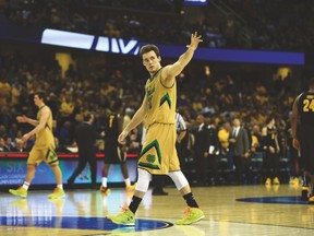 Notre Dame’s Pat Connaughton waves to the crowd during their win against the Wichita State Shockers on Thursday. (USA TODAY SPORTS)