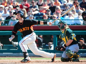 Giants' Buster Posey bounced back after a bad (for him) second half in 2013 to hit .311 with 22 home runs and solidify his status as fantasy baseball's No. 1 catcher. (AFP)