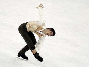 Javier Fernandez of Spain competes in the men’s free skating program during the ISU World Figure Skating Championship in Shanghai March 28, 2015. (REUTERS/Carlos Barria)