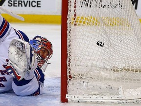 Henrik Lundqvist of the New York Rangers allows a goal by Milan Lucic of the Boston Bruins in the first period at the TD Garden on March 28, 2015 in Boston, Massachusetts.  (Jim Rogash/AFP)