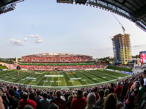 Fans take in the first home game of the Ottawa Redblacks CFL season at the newly build TD Place in Ottawa, July 18, 2014. (Ottawa Sun files)