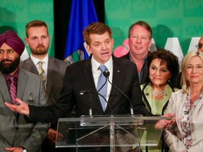 Brian Jean speaks in front of colleagues after his victory speech in the Wildrose Leadership Convention at the Sheraton Cavalier in Calgary, Alta., on Saturday, March 28, 2015. Jean was chosen as the new leader of the Wildrose Party on the first ballot. Lyle Aspinall/Calgary Sun