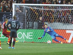 Real Salt Lake forward Alvaro Saborio scores past former Toronto FC goalkeeper Julio Cesar during their match last year. (USA TODAY SPORTS)