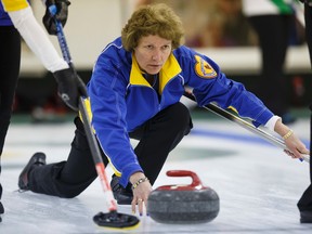 Alberta skip Terri Loblaw curls during the finals against Team Nova Scotia at the Canadian Seniors Curling Championships at Thistle Curling Club  on Saturday March 28, 2015. Ian Kucerak/Edmonton Sun