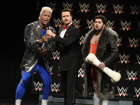 Dwayne "The Rock" Johnson (left) plays wrestler Coco Watch Out on the March 28, 2015 episode of "Saturday Night Live." Also pictured Taran Killam (centre) and Bobby Moynihan. (Supplied)