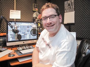 John Mielke poses in his home-studio radio setup, where he broadcasts 'The Milky Show' live on his online channel (Blast the Radio) each day.SUPPLIED IMAGE