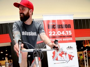 Nick Foley kicks of his ride-a-thon at the Quinte Mall Sunday, March 29, 2015. He rode, along with supports, for five hours as a way to raise awareness of his Ride for Inclusion, a cross-Canada bike ride he will be beginning on April 22. 
Emily Mountney/Belleville Intelligencer/QMI Agency