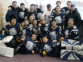 The Iqaluit Blizzard after defeating the Arnprior Young Guns to move on to the semi-finals at the Kids for Kids annual Hockey Tournament. (Steph Crosier, The Whig-Standard, QMI Agency)