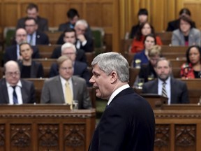 Canada's Prime Minister Stephen Harper outlines his government's plans to expand its military mission against Islamic State by launching air strikes against its positions in Syria as well as Iraq, in the House of Commons on Parliament Hill in Ottawa March 24, 2015. REUTERS/Chris Wattie
