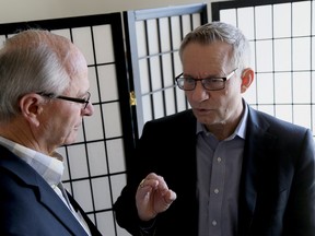 Bev Shipley, conservative MP for Lambton-Kent-Middlesex , left, and the Honourable Ed Fast, Minister of International Trade, speak after a round table event in Wallaceburg Saturday focused on connecting small and mid-sized business with opportunities abroad. (Diana Martin, The Daily News)