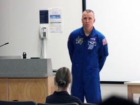 Astronaut Dr. Andrew Feustel spoke at Queen's University before receiving the Alumni Achievement Award in Kingston, Ont. on Saturday March 28, 2015. Steph Crosier/Kingston Whig-Standard/QMI Agency
