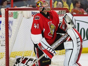 Ottawa Senators goaltender Craig Anderson looks at the replay after giving up a goal against the  Florida Panthers during NHL hockey action at the Canadian Tire Centre in Ottawa, Ontario on March 29, 2015. Errol McGihon/Ottawa Sun/QMI Agency