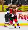 Ottawa Senators Erik Karlsson battles with Florida Panthers Dmitry Kulikov during NHL hockey action at the Canadian Tire Centre in Ottawa, Ontario on March 29, 2015. Errol McGihon/Ottawa Sun/QMI Agency