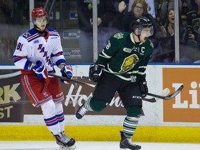 London Knights captain Max Domi celebrates in front of Kitchener Rangers defenceman Dmitri Sergeev after going end-to-end for a shorthanded goal in the first period of the Knights 6-2 win in Game 2 of their best-of-seven OHL Western Conference quarterfinal series. (DEREK RUTTAN, The London Free Press)