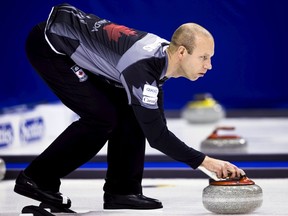 Canada skip Pat Simmons delivers a rock against China during the fourth draw of the World Men's Curling Championships in Halifax, Nova Scotia March 29, 2015. (REUTERS/Mark Blinch)