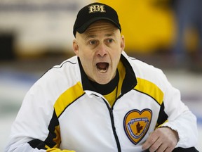 Manitoba skip Randy Neufeld calls during the finals against Team Quebec at the Canadian Seniors Curling Championships at Thistle Curling Club in Edmonton, Alta., on Saturday, March 28, 2015. Neufeld clipped Quebec's Ted Butler 5-3 to win the Canadian Senior Men's championship.
Ian Kucerak/Edmonton Sun/ QMI Agency