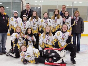 The Mitchell U12 ringette team won the Western Regional championship in Guelph this past weekend, defeating St. Thomas 5-3 in the final. Back row (left): Trevor Goetz (coach), Jenna Regele, Wayne Regele (coach), Ashtyn Wedow, Samantha McCarthy, Laura McCarthy, Nicole Simmons, Rob Simmons (coach), Sydney Smith, Deb McCarthy (trainer). Front row (left): Danielle Vogels, Jenna Deck, Gwenyth McKay, Emma Goetz. In front is goalie Amberleigh Dearing. SUBMITTED