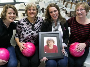 Co-ordinators of the 2015 Rose Bowl cancer fundraiser from let to right: Amy power, Janice Pitt, Ashley Thomson and Maureen Mackinnon. Thomson holds a picture of her mother Rose who dies from breast cancer in 2011. The annual fundraiser was created and named in Rose's memory.  - Tim Miller/The Intelligencer