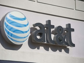 An SUV smashed through the glass storefront of a Long Island AT&T cellphone store March 30. (AFP/SAUL LOEB)