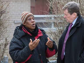 TCHC resident Ann Wallace confronted Mayor John Tory about the recent Metropass price hike. Tory broke an election promise by initiating a TTC fare hike this year. (CRAIG ROBERTSON, Toronto Sun)
